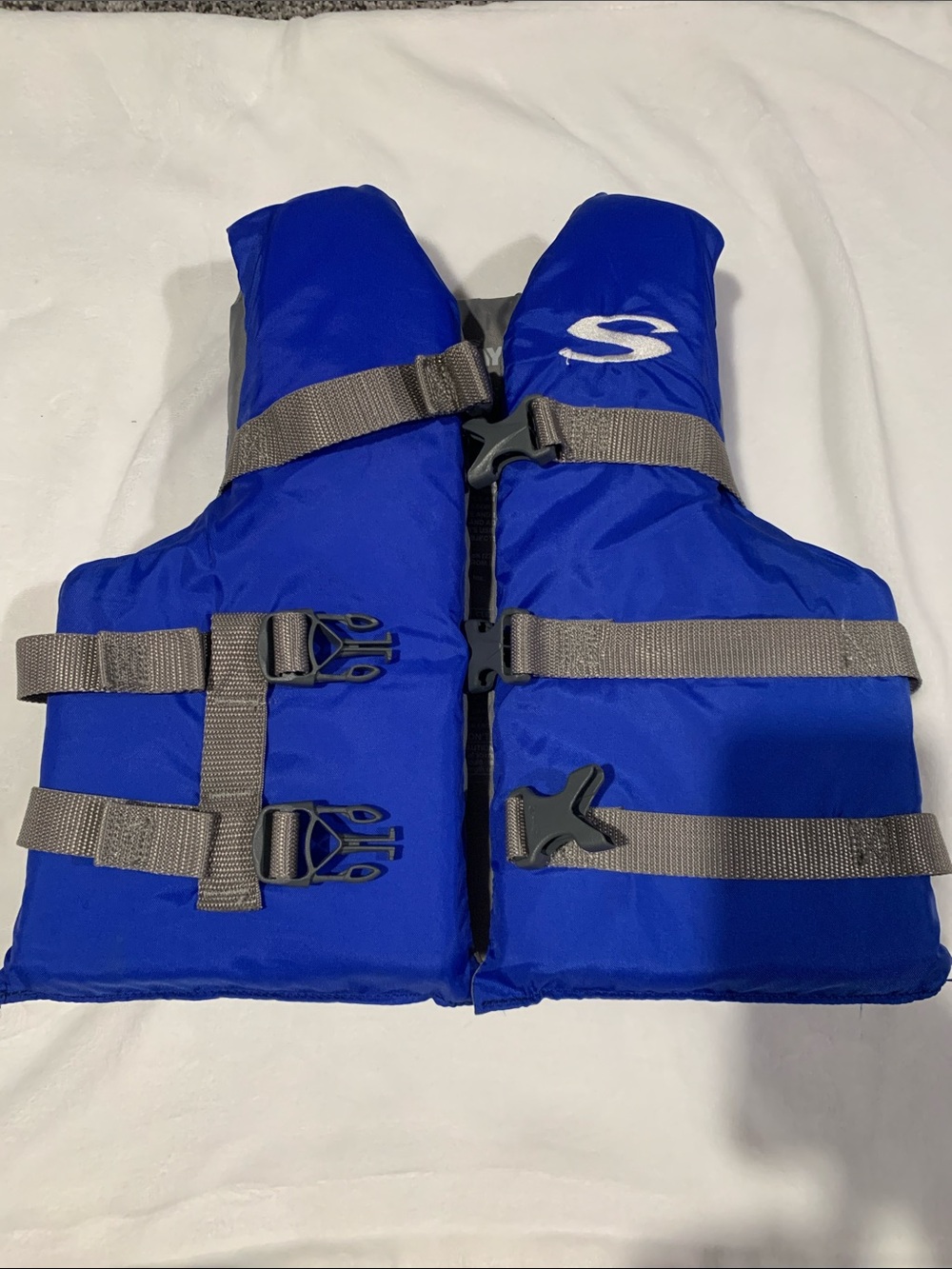 Youth Swim Life Jacket in Royal Blue with Adjustable Gray Straps